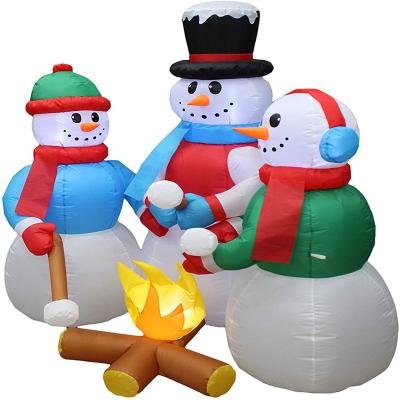 China Popular Christmas Fire Three Group Heating Luminous Inflatable Snowman Model 1.8m Polyester Inflatable Snow Model for sale