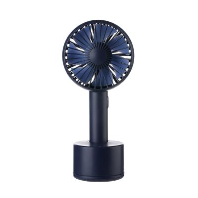 China Protable WSTA Mini Handheld 5 Portable Speed ​​Adjustment USB Fan With Rotate Charging Base for sale