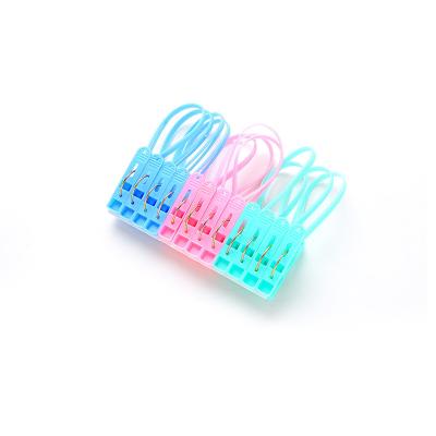 China Modern Portable Plastic 12pcs Clothes Drying Clip With Rope For Socks Underwear for sale