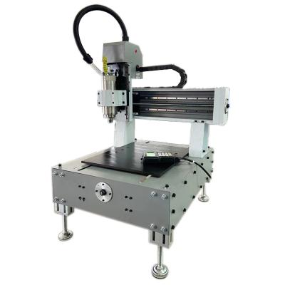 China New Model Mini Desktop Diy 4040 Cnc Router For Home Use en venta