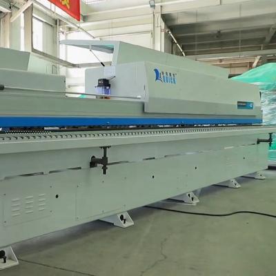 China Cnc Edge Banding Machine Edge Trimming Machine for sale en venta