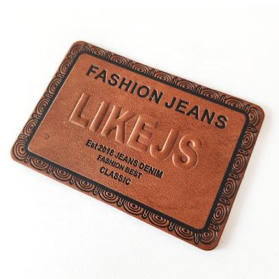 China 3D Custom Brand Logo Rectangle Trousers Leather Label Deboss 3D Raised Effect Jeans Leather Patch for sale