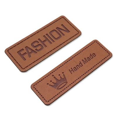 China Sustainable Apparel Heat Press Logo Patch Iron On Backing PU Leather Label For Trucker Hats for sale