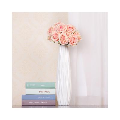 China 70% polyester fabric + 15% plastic + 15% yarn factory wholesale new artificial roses wedding hall photo decoration flowers for sale