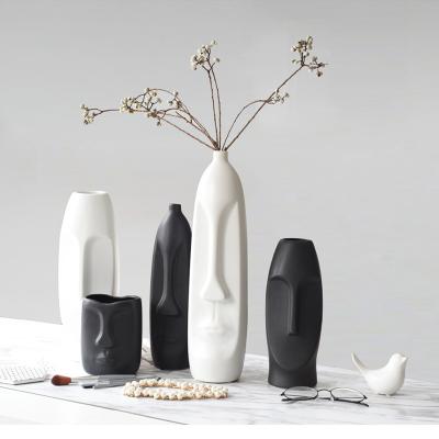 China Modern Ceramic Vases Ceramic Vases and Porcelain Vases for Home Decorative Nordic White Ceramic Vase Matte Flower Vases Minimalist Face for sale