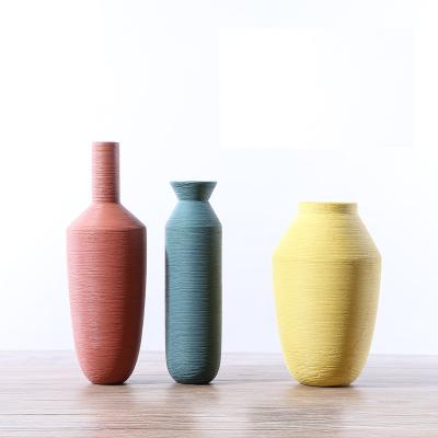 China Popular modern brushed geometric ceramic vases simple handmade restaurant crafts vases ware vase modern Nordic ceramic tabletop decoration for sale