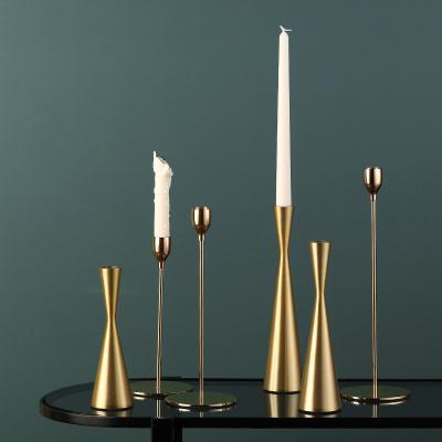 China Latest New Design Nordic Modern Luxury Gold Polished Metal Candelabra Candle Holders Candlesticks Light Candle Holder for sale