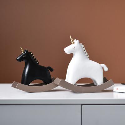 China Europe modern crafts ornament for handcraft sculpture Unicorn Figurine Statue Decoration in gift office decor small white black resin animals for sale