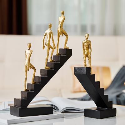 China Europe craft decoration figure luxury home ornaments with stairs resin ornament hotel office walking on stair office decor for sale