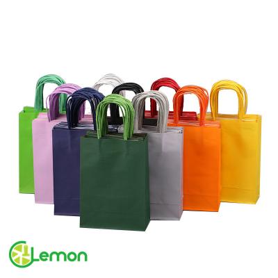 China Customized Different Colors Handmade And Logo Kraft Paper Bag With Handle Food Gift Flower Paper Bag Eco-friendly Paper Bag for sale