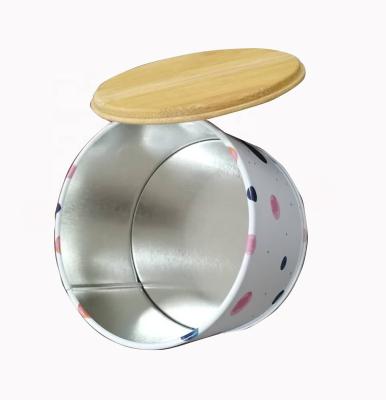 China Tea Food Tins New Design Round Tea Pot Tins Printed Tea Tin Box Cylinder Metal With Bamboo Lid for sale