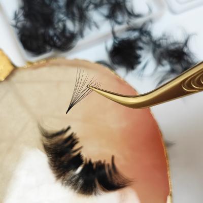 China Wholesale Natural Loose Long Fans 500Fans Fake Lashes Lashes Soft Extension Vietnam Black Cross for sale