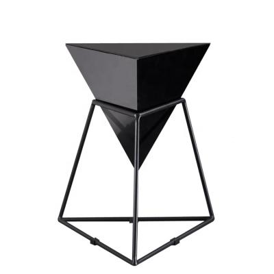 China Asian Adjustable Black Glass Stainless Steel Coffee Table Unique High End Triangle Panel Rock Claw (Others) Legs for sale