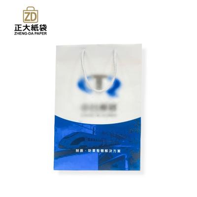 China High Quality Eco-friendly Shopping Paper Bag With Your Own Logo for sale