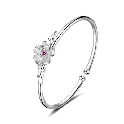 China FASHIONABLE Korean hot sale beautiful flower design alloy bracelet with platinum plate and adjustable opening for sale