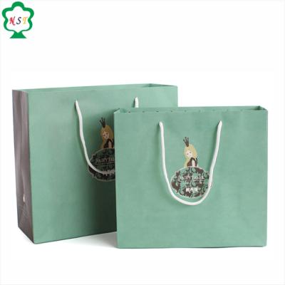 China Recyclable High Quality Custom Logo Printed Shopping Paper Gift Bag With Handle for sale