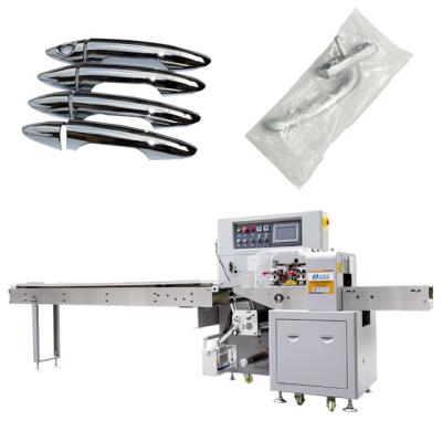 China Three servo automatic hardware door handle horizontal packaging machine zu verkaufen