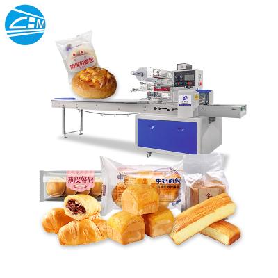 China Rotary Automatic Plastic Pillow Bag Sweet Chocolate Candy Bread Biscuit Flow Packing Machine for sale