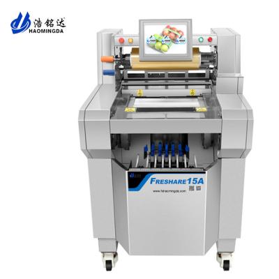 China Price of haomingda automatic preservative film packaging machine zu verkaufen