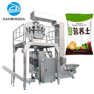 中国 Customized Big Package Plastic Bag Vertical Sand / Nutritional Soil Packing Machine 販売のため