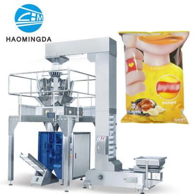 China Hot Sale Full Automatic Snack Potato Chips Packing Machine Vertical Filling Sealing Machine zu verkaufen