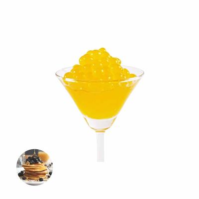 China Amazon Hot Sale Nutritious Mango Flavored Popping Boba For Shaved Ice Truck Use for sale