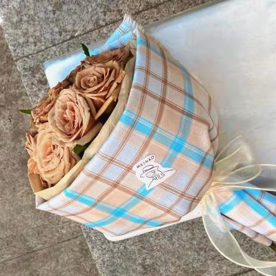 China Vintage Cotton Gift Wrap Buffalo Wrap Elegant Plaid Fabric Waterproof Bouquet Cotton Wrapping Paper For Flowers for sale