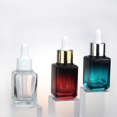 China Square 30ml 1oz Cosmetic Custom Logo Red Wine Essential Oil Blue Transparent Glass Bottle for sale