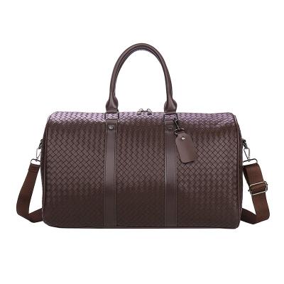 China 2021 Multifunctional Woven Travel Duffel Bag Duffel Bag PU Braided Leather Panniers Men Waterproof Large Travel Handbag Duffel Bag Travel Bag for sale