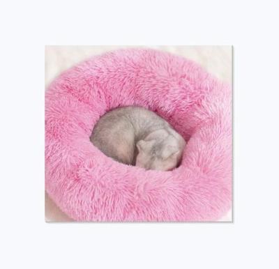 China Super Luxury Round Donut Breathable Cat Dog Bed Cheap Novelty Soft Fluffy for sale