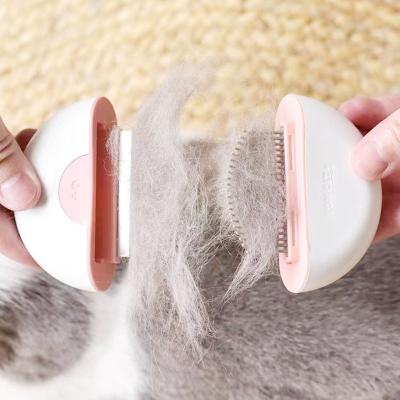 China Circle Plastic Material Hair Cleaning In Stock And Dod Pet Cat Comb for sale