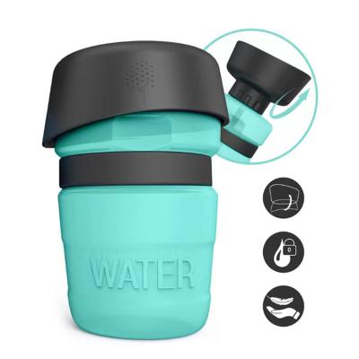 China New Stocked Outdoor Dog Products Water Bottle Driver 520ml Dog Water Bottle With Food Space for sale