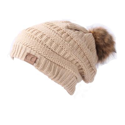 China COMMON Thick Cable Knit Faux Fuzzy Fur Pom Fleece Lined Skull Cap Cuff Beanie hat for sale