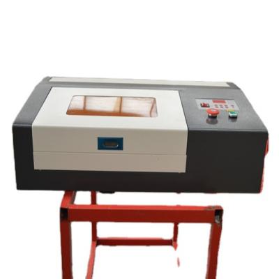 China Laser Engraving 3020 Laser 40w With Ruida Laser Cutter 40W 50W XP400 CO2 Laser Engraving Machine With CE ISO for sale