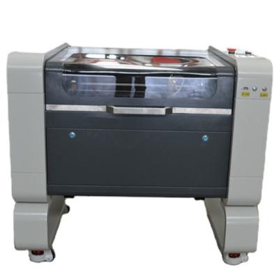 China Laser Engraving 6040 Laser with Ruida CNC Neje Master 2 CO2 60W/80W/100W Laser Cutting and Engraving Machine for sale