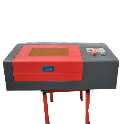 China Laser Engraving MJ 3020 Cutter Laser and 50W Leather Plastic Acrylic 40W Wood Fabric Engraving Machine for sale