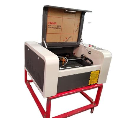 China Laser CUTTING New Ruida 40W 50W MJ 4040 Temper Glass Cutting Machine CO2 Laser Engraving And Cutting Machine for sale