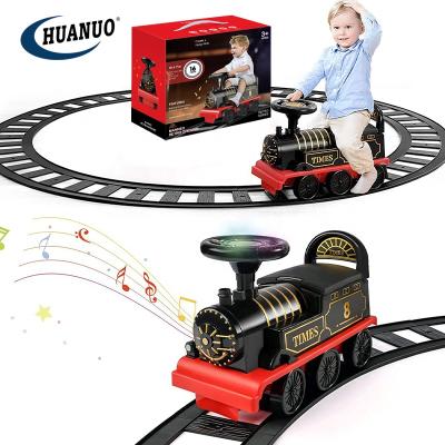 China Ride On Toy Kids Light Music Train Track Sit To Learn Toy Electric Ride On Car Toy Car for sale