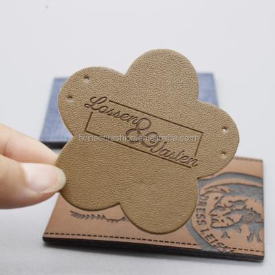 China Custom new fashion TS CLOTHES jeans jeans metal label PU leather patch for garment for sale