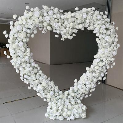 China 2023 Outdoor Indoor Weddings Arch Decoration Heart Shape Arch Artificial Flower Decorated Wedding Decoration Stage for sale