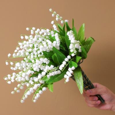 China Natural Plastic White Plastic Orchid Bouquet Floral Artificial Lily Artificial Flower For Wedding Valley Touch Home Decor for sale