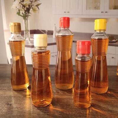 China Chinese 100ml empty spice jar bottle cooking oil supplier vinegar food soy sauce vinegar storage glass bottles with plastic lids for sale