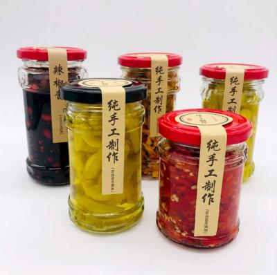 China Wholesale 200ml Sustainable Glass Jar For Pickle Food Industry Storage Jars Empty Clear Glass For Beef Paste Ketchup With Black Metal Lids for sale