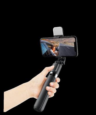 China Tripod/Remote Controller 1000mm Height Price Good L03s Mini Selfie Stick Tripod With Fill Light Phone Tripod Holder 360 Degree Rotation Remote Selfie Stick for sale