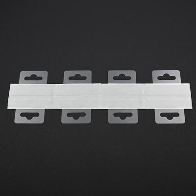 China Waterproof Wholesales Clear Self Adhesive Hang Tabs Hooks Plastic Display Hand Tabs Slot Hole Folding Tab for Store Retail Display for sale