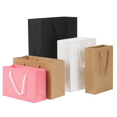 China Disposable Professional Factory Kraft Paper Shopping Paper Gift Bags With Your Own Logo for sale