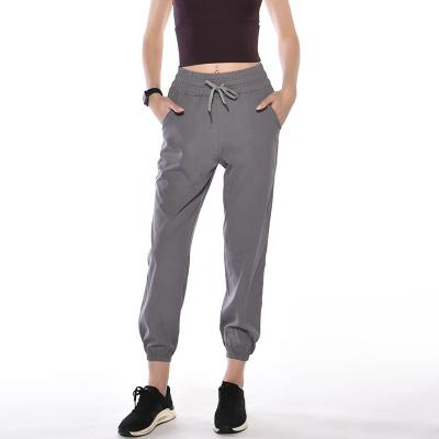 China Breathable Woman Sports Yoga Gaiters Loose Leg High Waist Slim Casual Pants for sale