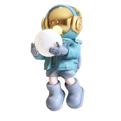 China Other Polyresin Astronaut Resin Cosmonaut Statue Creative Craft Sculpture Finished Astronaut Home Decor Sculptures for sale