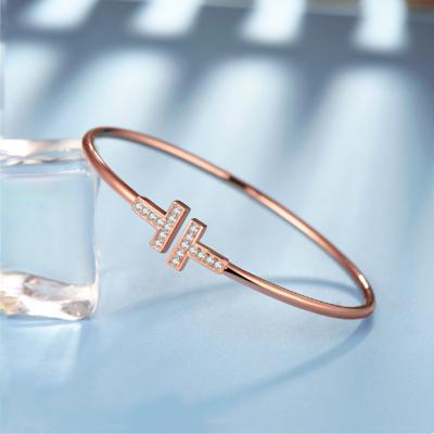 China High quality fashion minimalist design rose gold couple bracelet t word inlaid open zircon bracelet gift for sale