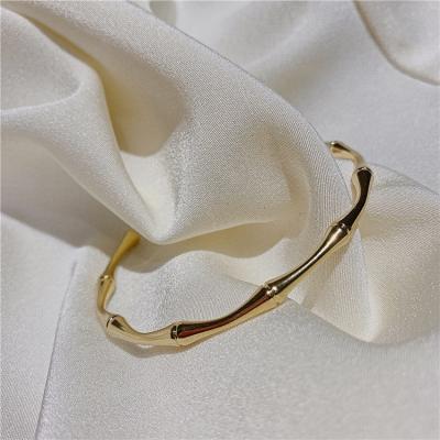 China Simplicity Wholesale High Quality Custom Bamboo Cute Gold Color Female Bracelet Metal Bangle For Daily Wear for sale